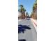 Palm tree lined street leads to various properties and amenities within the community at 9050 W Warm Springs Rd # 1092, Las Vegas, NV 89148