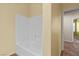 Bathroom highlighting a white tiled tub and shower combination at 9233 Onyx Point Ct, Henderson, NV 89074