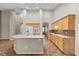 Bright, open kitchen with spacious center island and stainless steel appliances at 9233 Onyx Point Ct, Henderson, NV 89074