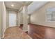 Bright living space with hardwood floors, neutral walls, and large windows at 9233 Onyx Point Ct, Henderson, NV 89074