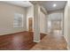 Spacious living area with hardwood floors, neutral walls, and a view of other rooms at 9233 Onyx Point Ct, Henderson, NV 89074
