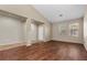 Spacious living area with hardwood floors, neutral walls, and large windows at 9233 Onyx Point Ct, Henderson, NV 89074