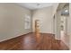 Bright living space with hardwood floors, neutral walls, and large windows at 9233 Onyx Point Ct, Henderson, NV 89074