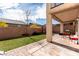 Well-kept backyard with artificial grass and patio with direct access to the house at , Las Vegas, NV 89166