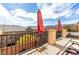 Relaxing balcony area with seating and views of surrounding homes under a bright sky at , Las Vegas, NV 89166