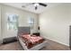 Cozy bedroom with neutral walls, carpeted floor, and great natural light from two windows at , Las Vegas, NV 89166