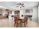 Open-concept dining room and kitchen featuring stainless steel appliances and a breakfast bar at , Las Vegas, NV 89166