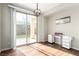Bright dining area with backyard access, showcasing a modern light fixture and convenient built-in desk at , Las Vegas, NV 89166