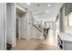 Open entryway featuring tile flooring, a staircase, and a view leading into the living area at , Las Vegas, NV 89166