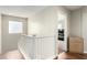 Upstairs hallway with wood floors and a view into the adjacent room at , Las Vegas, NV 89166