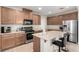 Modern kitchen with stainless steel appliances, a functional center island, and plenty of counter space for meal preparation at , Las Vegas, NV 89166