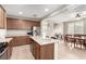 Open kitchen layout flowing into the dining area, featuring a center island and stainless steel appliances at , Las Vegas, NV 89166