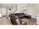 Inviting living room featuring a sectional, staircase, and neutral paint, creating a cozy atmosphere at , Las Vegas, NV 89166