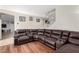 Relaxing living room features a sectional sofa, hardwood floors, staircase, and neutral walls at , Las Vegas, NV 89166