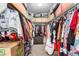 Spacious walk-in closet with ample hanging space and storage boxes; great organizational potential at , Las Vegas, NV 89166