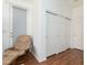 Relaxing bedroom area with a comfortable chair and ample closet space at 10240 Notte Ave, Las Vegas, NV 89135