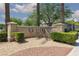 Stone sign marking the entrance to Siena Golf Club with manicured landscaping at 10240 Notte Ave, Las Vegas, NV 89135