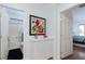 Hallway view featuring a framed painting and a bathroom view at 10240 Notte Ave, Las Vegas, NV 89135