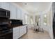 Eat-in kitchen with modern appliances, breakfast nook, and light and bright bay windows at 10240 Notte Ave, Las Vegas, NV 89135