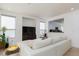 Living room featuring an open floor plan with light tile floors and lots of natural light at 10240 Notte Ave, Las Vegas, NV 89135