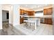 Bright kitchen with stainless steel appliances, granite counters, and a center island at 10429 Rose Palisade St, Las Vegas, NV 89141
