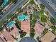 Stunning aerial view showcases the home's premium location and resort-style backyard oasis with sparkling pool at 10645 Redwood Grove Ave, Las Vegas, NV 89144