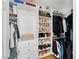 Well-organized walk-in closet with ample storage space for shoes, clothes, and accessories at 10645 Redwood Grove Ave, Las Vegas, NV 89144