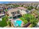 Beautiful backyard showcasing a pool, hot tub, patio, and balcony, perfect for enjoying the outdoors in style at 10656 Hyde Corner Ave, Las Vegas, NV 89166