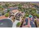 Aerial view of a home with a pool, gazebo, and solar panels in a suburban neighborhood at 10656 Hyde Corner Ave, Las Vegas, NV 89166