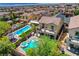 Gorgeous backyard featuring a sparkling pool, spa, outdoor seating, and a covered patio perfect for entertaining guests at 10656 Hyde Corner Ave, Las Vegas, NV 89166
