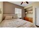 Bedroom featuring wood floors, built in storage and neutral paint at 10656 Hyde Corner Ave, Las Vegas, NV 89166