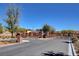 Gated community entrance with brick pillars and secure access for residents at 10656 Hyde Corner Ave, Las Vegas, NV 89166