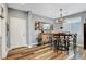 This dining area features stylish floors, modern lighting and decor at 10656 Hyde Corner Ave, Las Vegas, NV 89166