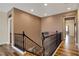 Stylish hallway with wood floors, neutral paint, and decorative accents at 10656 Hyde Corner Ave, Las Vegas, NV 89166