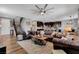 Spacious living room showcasing hardwood floors and seamlessly connecting to the open kitchen at 10656 Hyde Corner Ave, Las Vegas, NV 89166