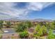 Scenic neighborhood view showcasing lush landscaping, well-maintained homes, and majestic mountain backdrop at 10656 Hyde Corner Ave, Las Vegas, NV 89166