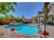 Inviting backyard pool with a built-in spa and lovely brickwork at 10656 Hyde Corner Ave, Las Vegas, NV 89166