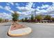 View of community street lined with landscaping, sidewalks, and well-maintained homes at 10656 Hyde Corner Ave, Las Vegas, NV 89166