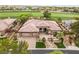 Incredible aerial view of a large single-Gathering home with a putting green and pool overlooking the golf course at 11 Knob Oak Dr, Henderson, NV 89052