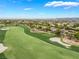Expansive green golf course view in this community with mature trees, sand traps and mountain views at 11 Knob Oak Dr, Henderson, NV 89052