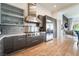 Modern kitchen features stainless steel appliances, custom cabinetry, and spacious countertops at 11 Knob Oak Dr, Henderson, NV 89052