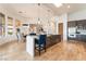 Bright open kitchen with breakfast bar, stainless steel appliances, and skylights at 11 Knob Oak Dr, Henderson, NV 89052