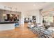 Bright and airy living room with modern decor, wood floors, and an open floor plan at 11 Knob Oak Dr, Henderson, NV 89052
