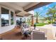 Cozy covered patio with comfortable seating and golf course views at 11 Knob Oak Dr, Henderson, NV 89052