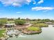Aerial shot of a gorgeous community water feature with waterfalls and lush landscaping on a golf course at 11 Knob Oak Dr, Henderson, NV 89052