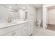 Bathroom with a double vanity, a walk-in shower, and tile floors at 1102 E Dorrell Ln, North Las Vegas, NV 89086
