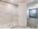 Walk-in shower with glass door and tile floors at 1102 E Dorrell Ln, North Las Vegas, NV 89086