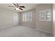 Bright bedroom with two shuttered windows providing natural light and privacy at 11056 Kilkerran Ct, Las Vegas, NV 89141