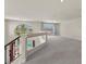 Bright loft with windows overlooking the pool and backyard below at 11056 Kilkerran Ct, Las Vegas, NV 89141