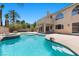 Wonderful swimming pool featuring a hot tub, with rock features and a backyard view at 11056 Kilkerran Ct, Las Vegas, NV 89141